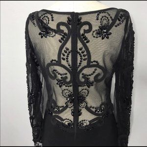 This dress is dynamite!!!! Size 8, sexy!